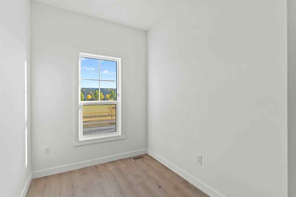 MLS® A2262676 - Unit #109 156 Park Street  in Greystone Cochrane, Residential