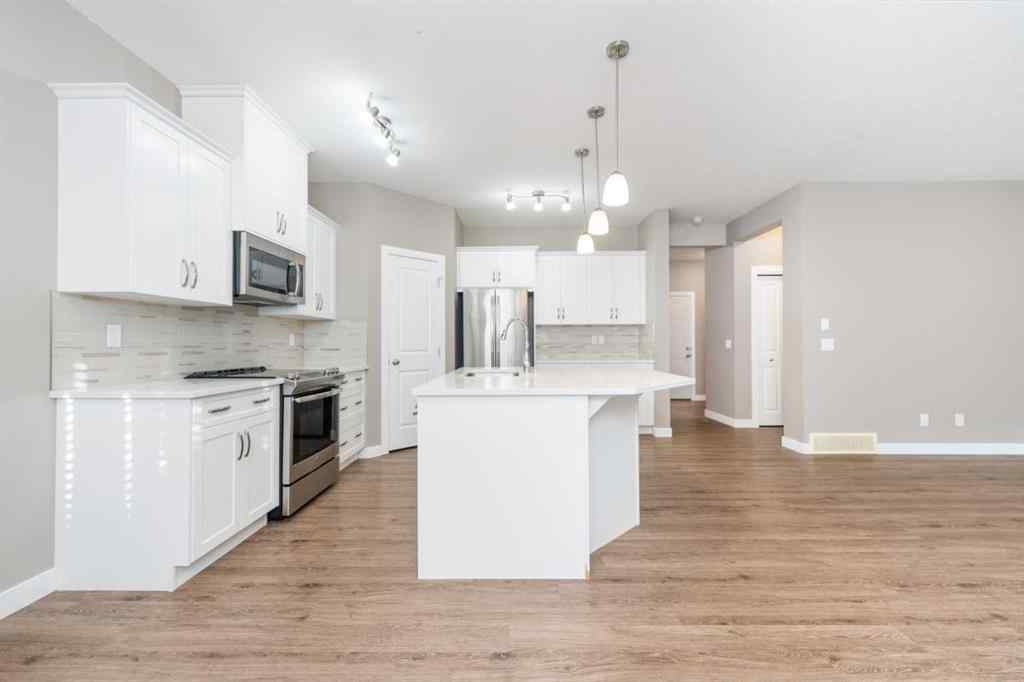 MLS® A2262693 - 243 Kinniburgh Road  in Kinniburgh North Chestermere, Residential
