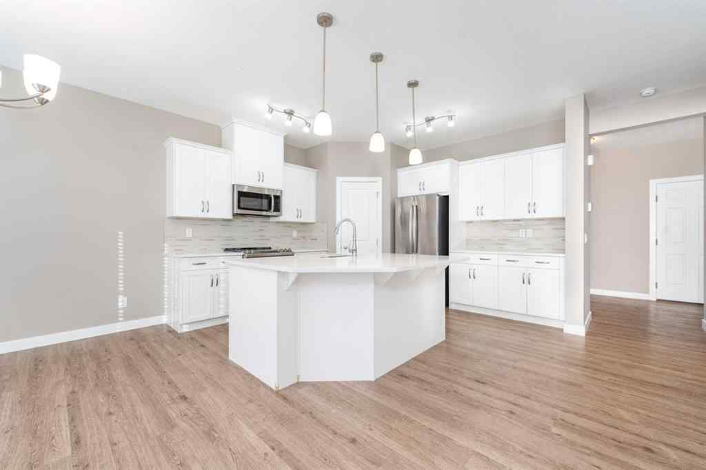 MLS® A2262693 - 243 Kinniburgh Road  in Kinniburgh North Chestermere, Residential