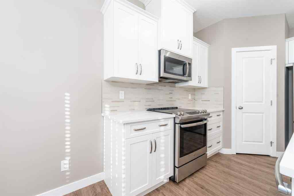 MLS® A2262693 - 243 Kinniburgh Road  in Kinniburgh North Chestermere, Residential