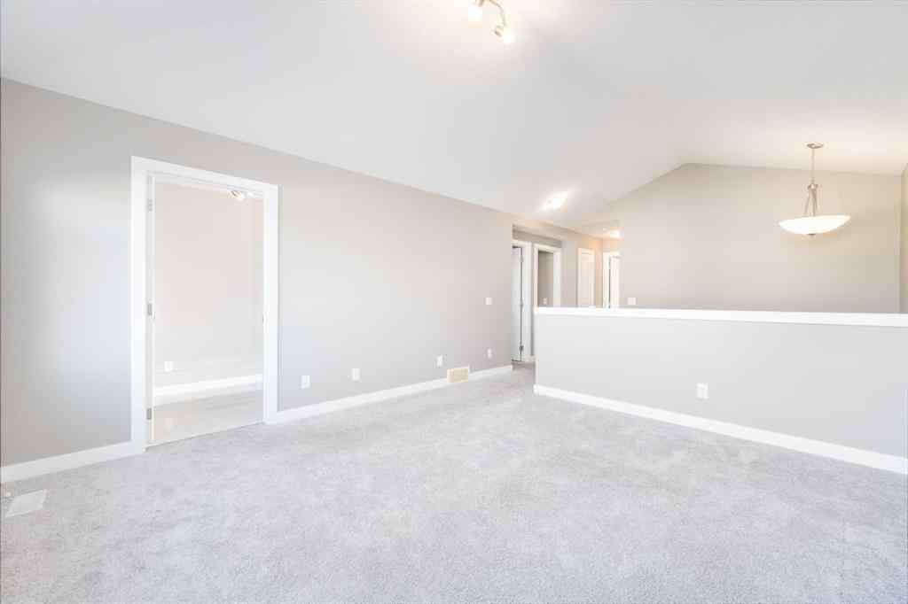 MLS® A2262693 - 243 Kinniburgh Road  in Kinniburgh North Chestermere, Residential