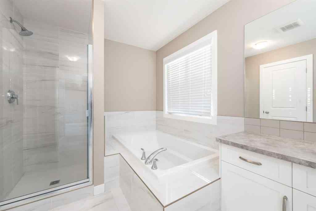 MLS® A2262693 - 243 Kinniburgh Road  in Kinniburgh North Chestermere, Residential