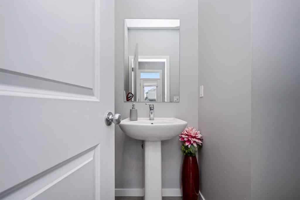 MLS® A2262697 - 229 Belmont Street SW in Belmont Calgary, Residential