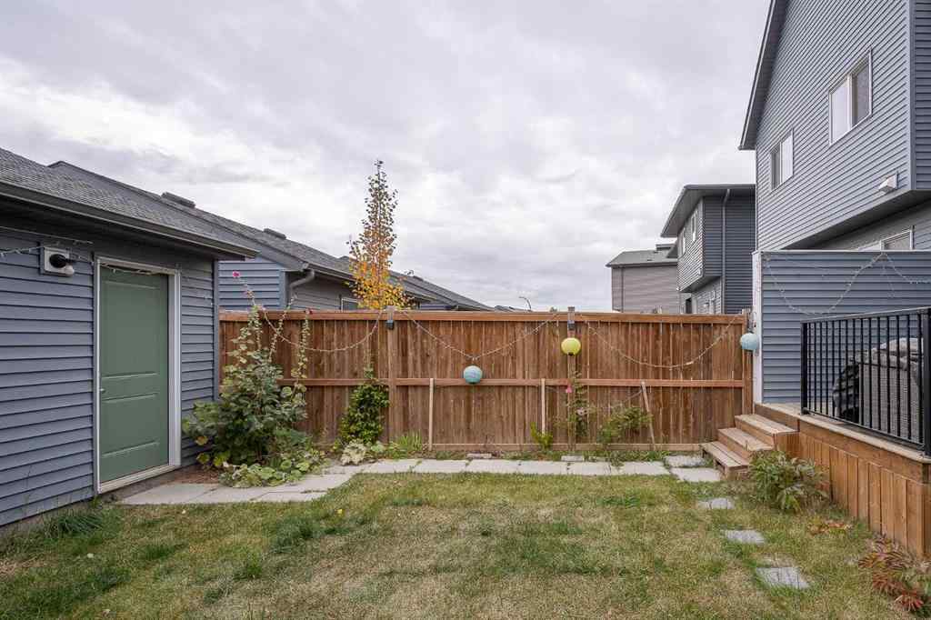 MLS® A2262697 - 229 Belmont Street SW in Belmont Calgary, Residential