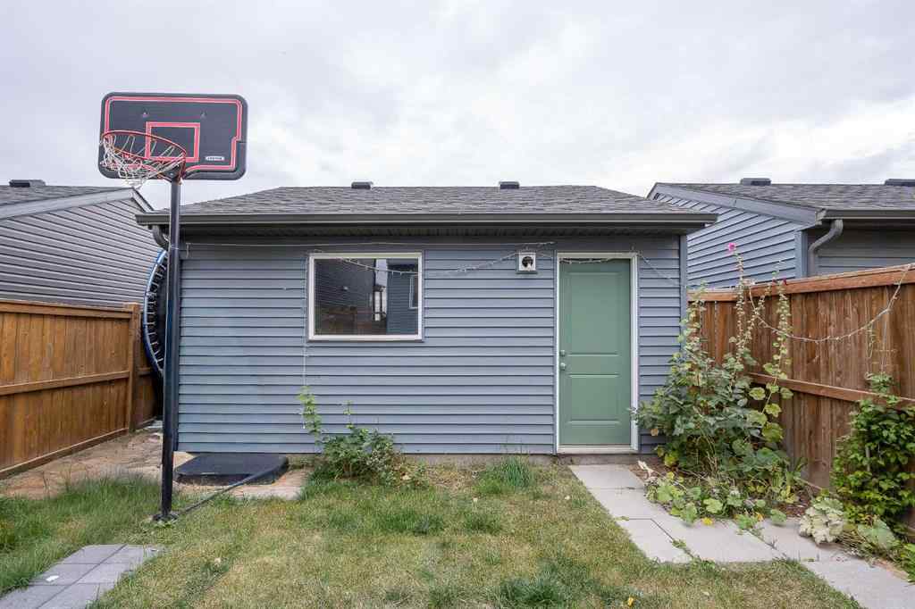 MLS® A2262697 - 229 Belmont Street SW in Belmont Calgary, Residential