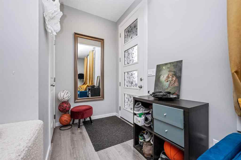 MLS® A2262697 - 229 Belmont Street SW in Belmont Calgary, Residential