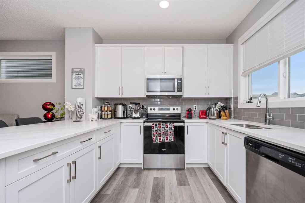 MLS® A2262697 - 229 Belmont Street SW in Belmont Calgary, Residential