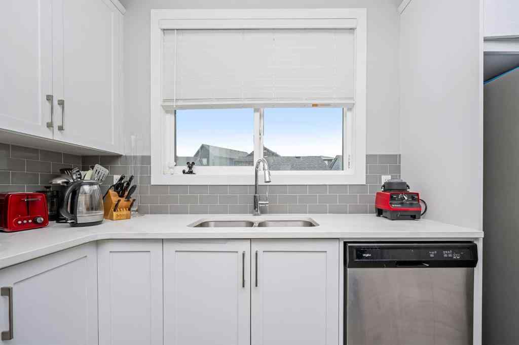 MLS® A2262697 - 229 Belmont Street SW in Belmont Calgary, Residential