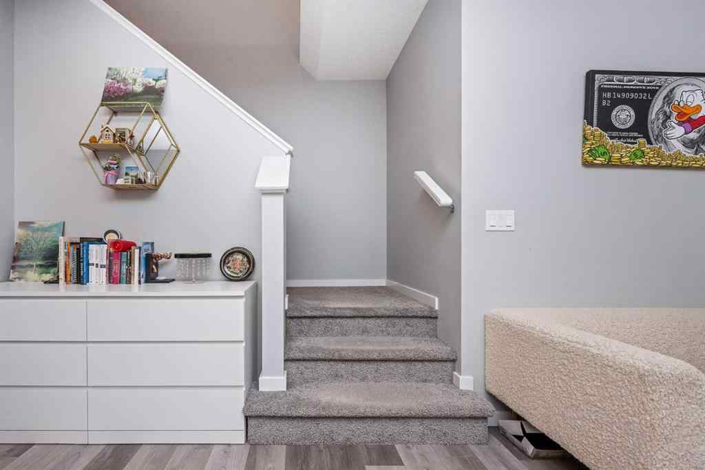 MLS® A2262697 - 229 Belmont Street SW in Belmont Calgary, Residential
