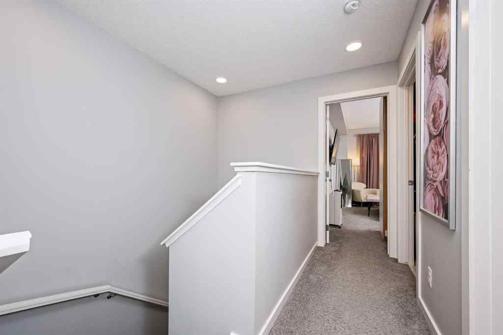 MLS® A2262697 - 229 Belmont Street SW in Belmont Calgary, Residential