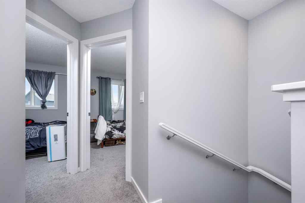 MLS® A2262697 - 229 Belmont Street SW in Belmont Calgary, Residential