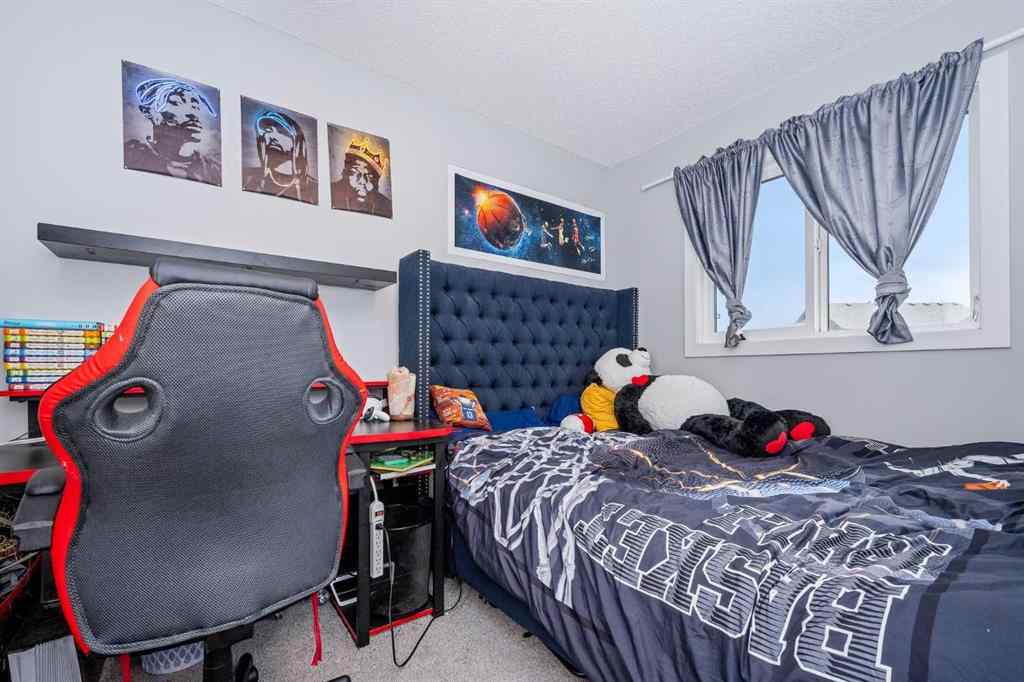 MLS® A2262697 - 229 Belmont Street SW in Belmont Calgary, Residential