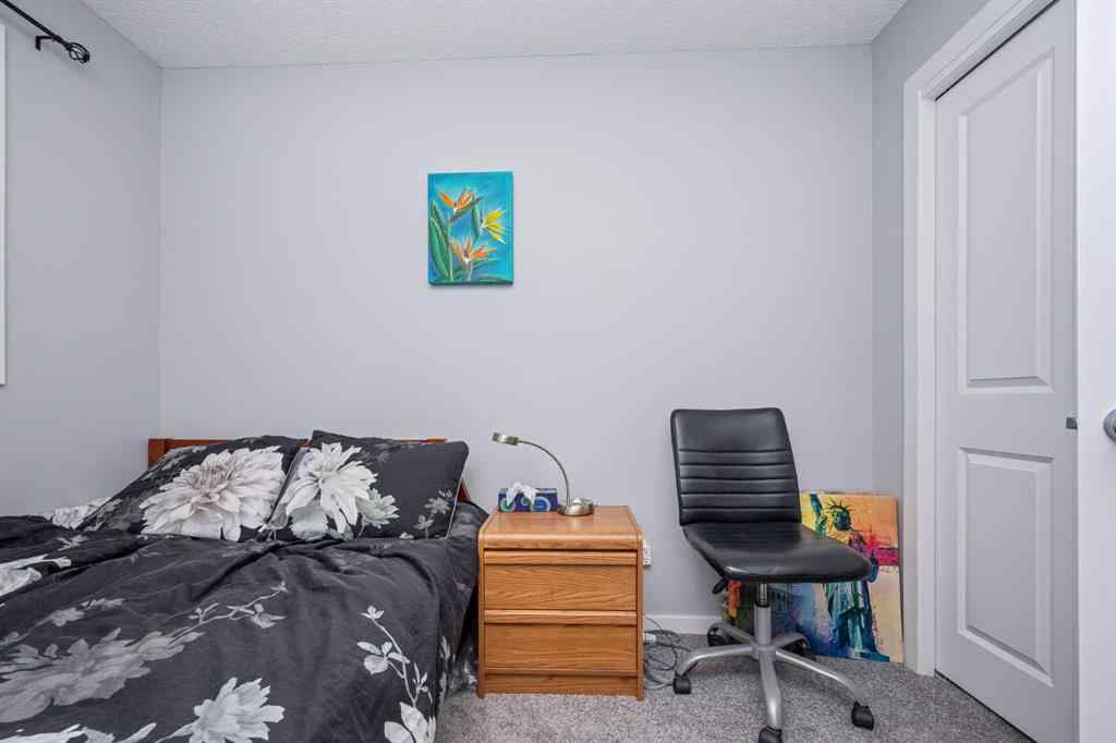 MLS® A2262697 - 229 Belmont Street SW in Belmont Calgary, Residential