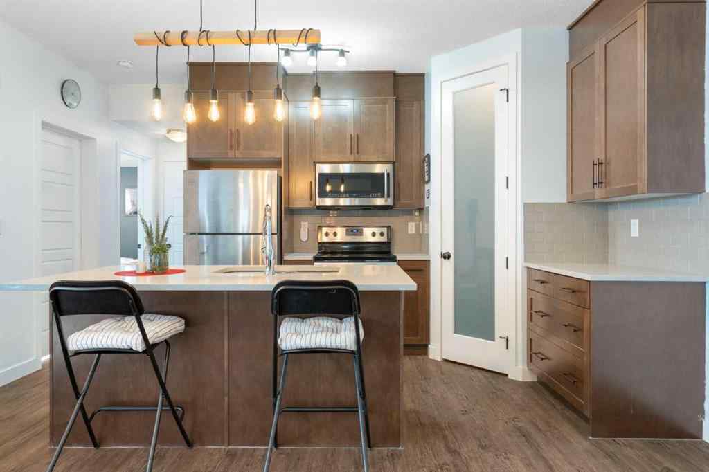 MLS® A2262707 - Unit #1104 2461 Baysprings Link SW in Baysprings Airdrie, Residential
