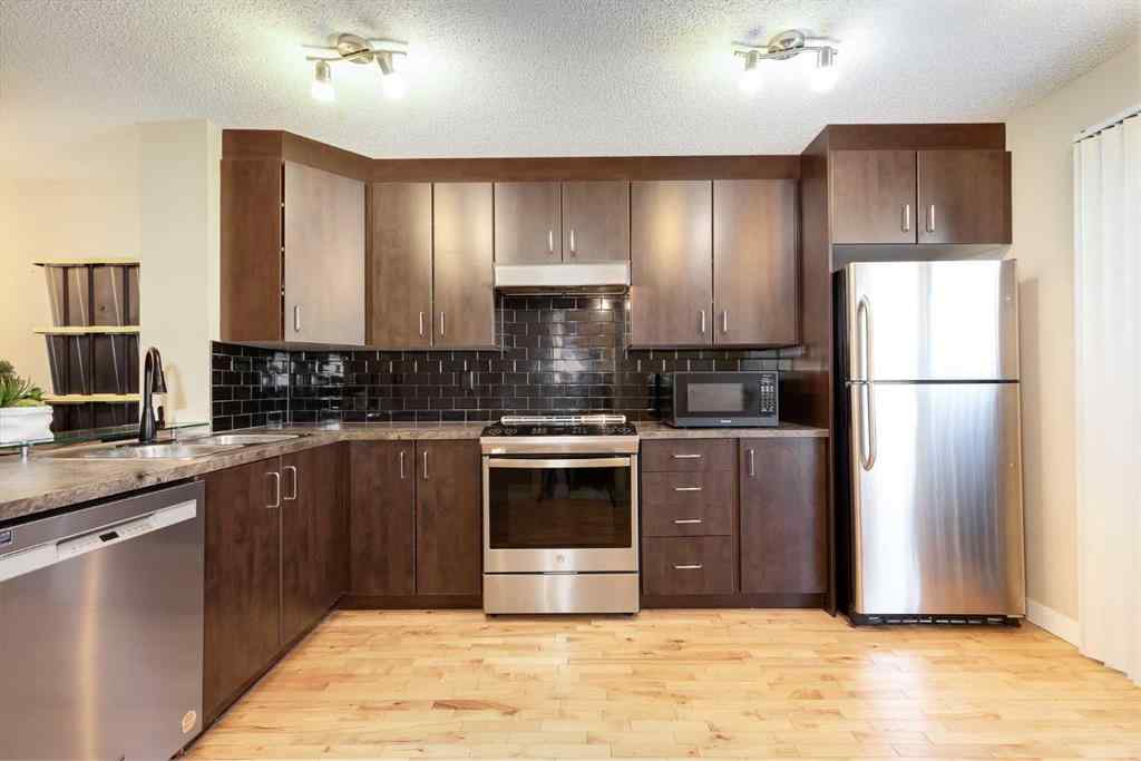 MLS® A2262719 - Unit #306 2445 Kingsland Road SE in Kings Heights Airdrie, Residential
