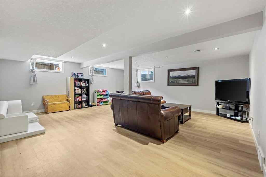 MLS® A2262740 - 2003 117 Avenue SW in Woodlands Calgary, Residential