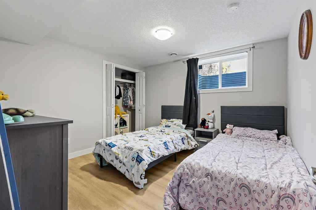 MLS® A2262740 - 2003 117 Avenue SW in Woodlands Calgary, Residential