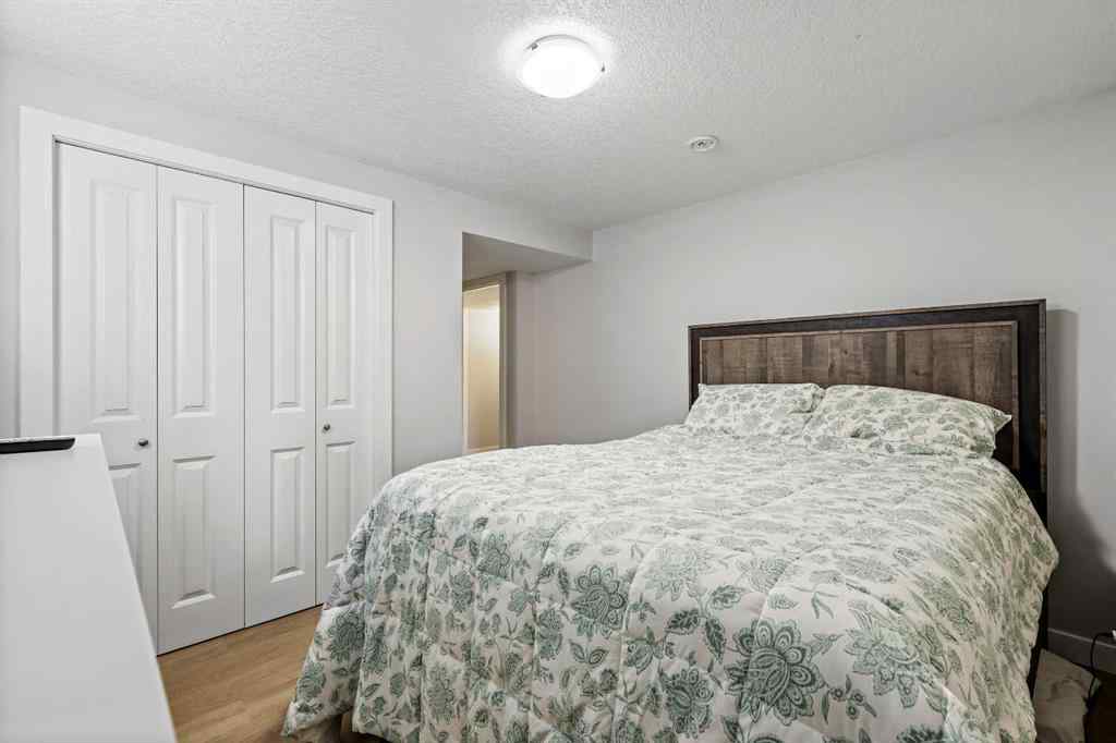 MLS® A2262740 - 2003 117 Avenue SW in Woodlands Calgary, Residential