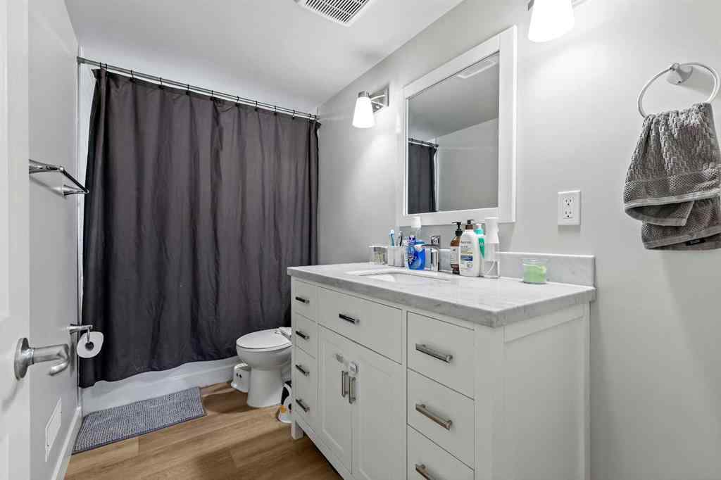 MLS® A2262740 - 2003 117 Avenue SW in Woodlands Calgary, Residential