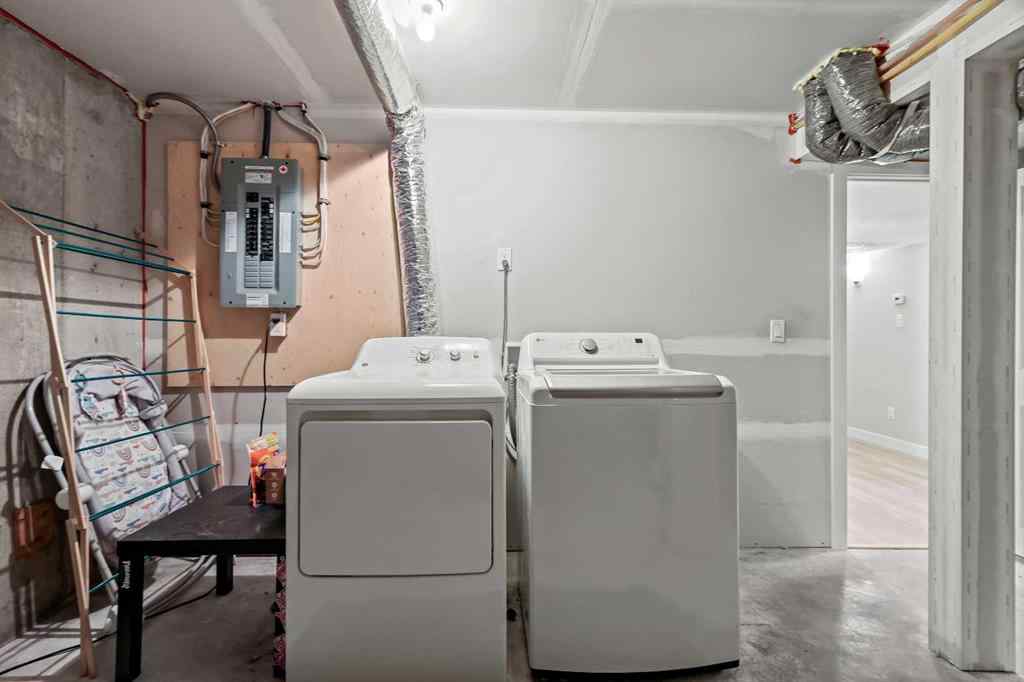 MLS® A2262740 - 2003 117 Avenue SW in Woodlands Calgary, Residential