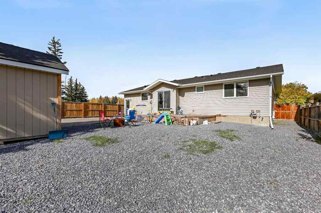 MLS® A2262740 - 2003 117 Avenue SW in Woodlands Calgary, Residential