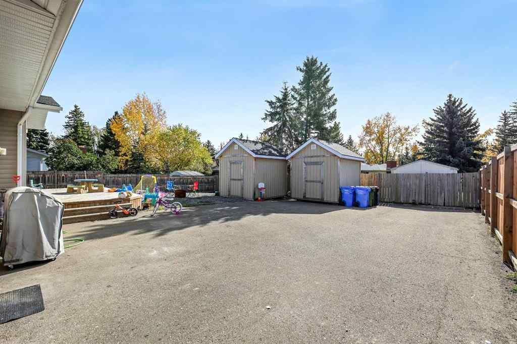 MLS® A2262740 - 2003 117 Avenue SW in Woodlands Calgary, Residential