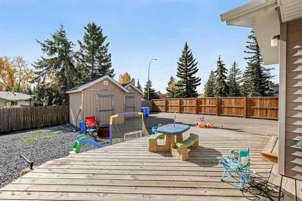 MLS® A2262740 - 2003 117 Avenue SW in Woodlands Calgary, Residential
