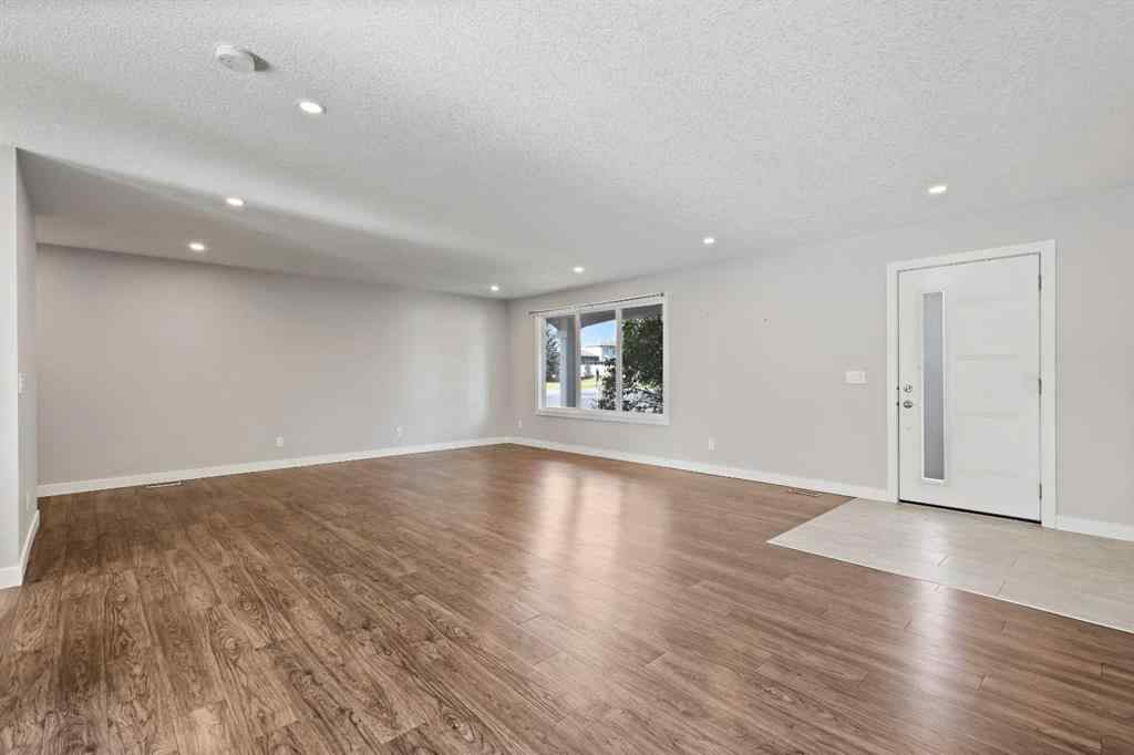 MLS® A2262740 - 2003 117 Avenue SW in Woodlands Calgary, Residential