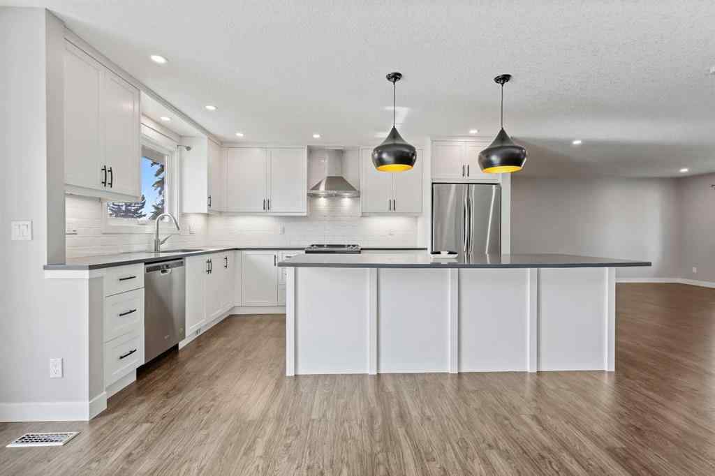 MLS® A2262740 - 2003 117 Avenue SW in Woodlands Calgary, Residential