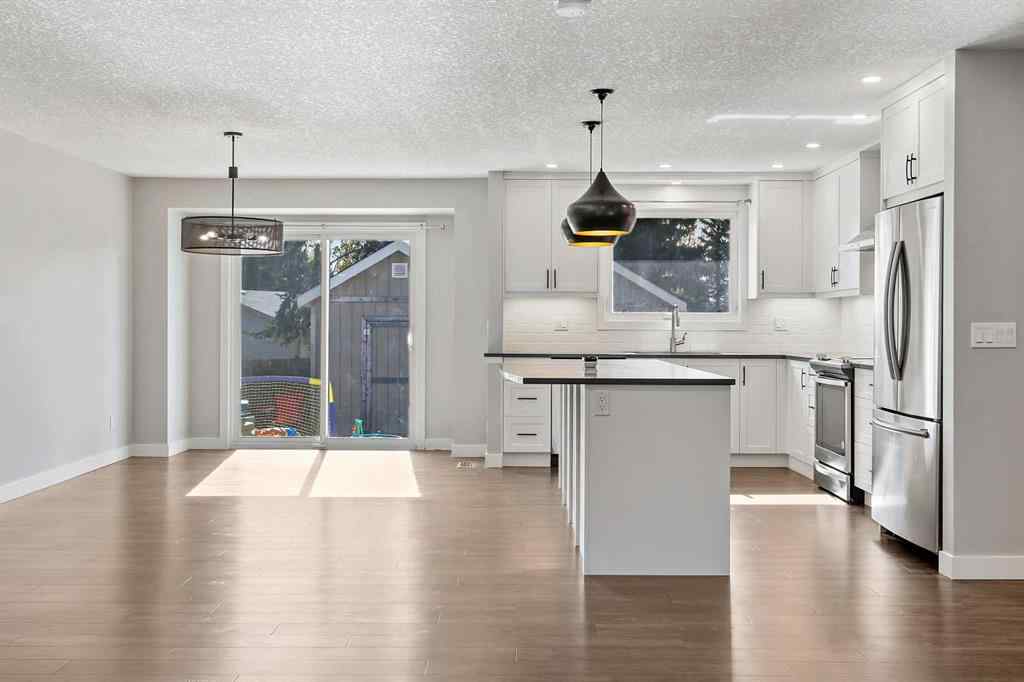 MLS® A2262740 - 2003 117 Avenue SW in Woodlands Calgary, Residential