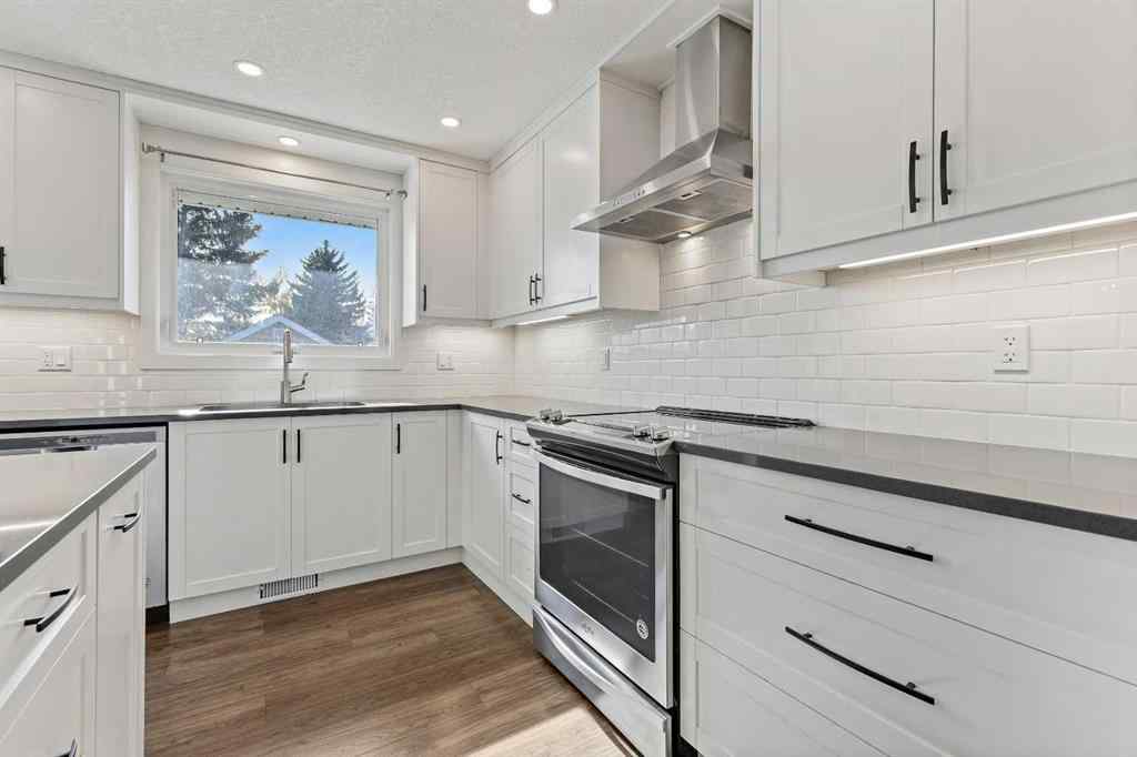 MLS® A2262740 - 2003 117 Avenue SW in Woodlands Calgary, Residential