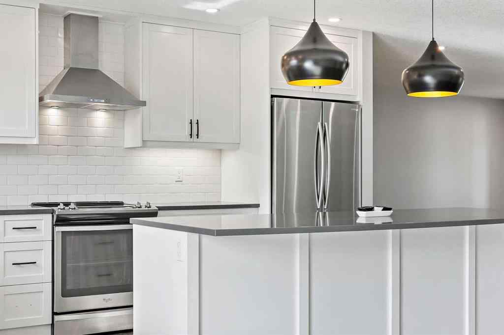 MLS® A2262740 - 2003 117 Avenue SW in Woodlands Calgary, Residential