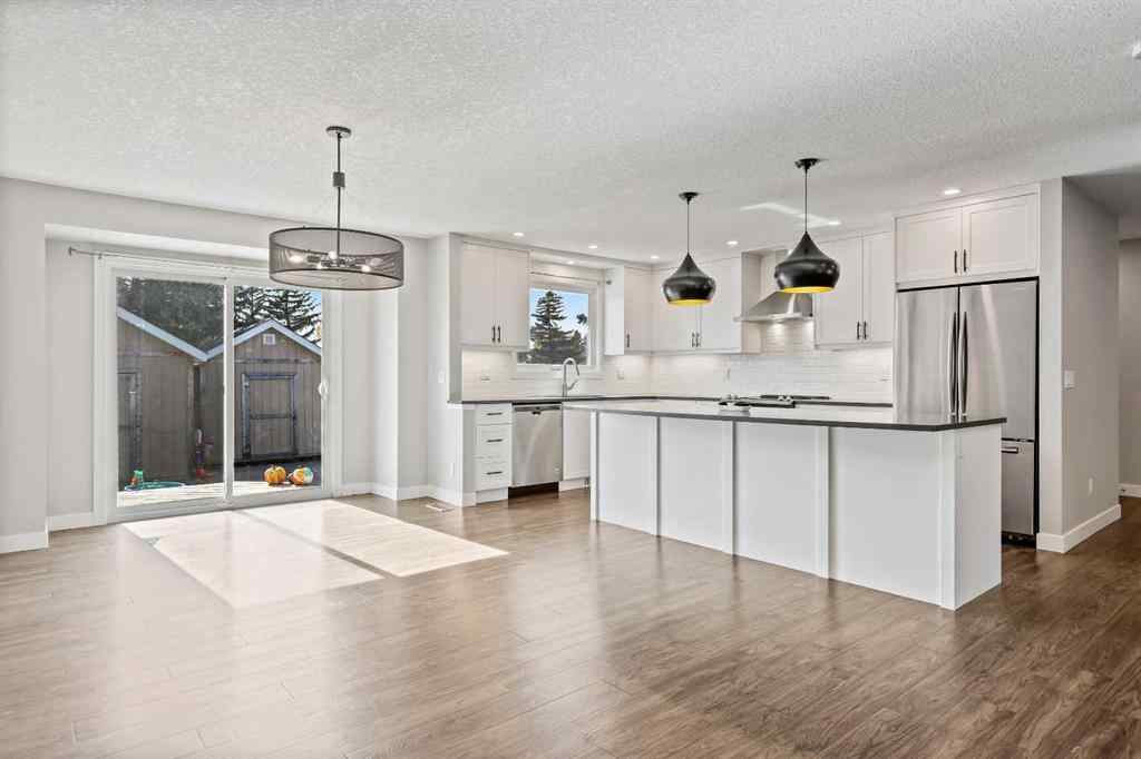 MLS® A2262740 - 2003 117 Avenue SW in Woodlands Calgary, Residential