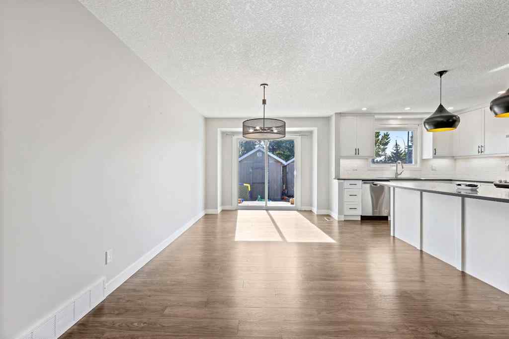 MLS® A2262740 - 2003 117 Avenue SW in Woodlands Calgary, Residential