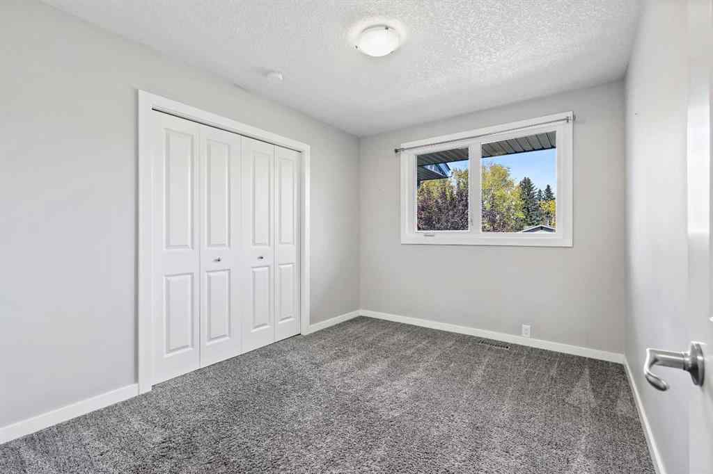 MLS® A2262740 - 2003 117 Avenue SW in Woodlands Calgary, Residential