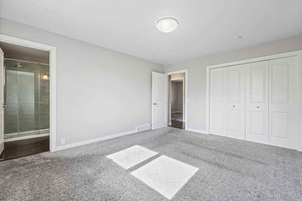 MLS® A2262740 - 2003 117 Avenue SW in Woodlands Calgary, Residential