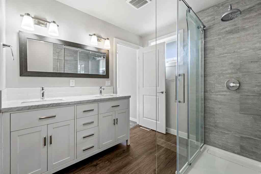 MLS® A2262740 - 2003 117 Avenue SW in Woodlands Calgary, Residential