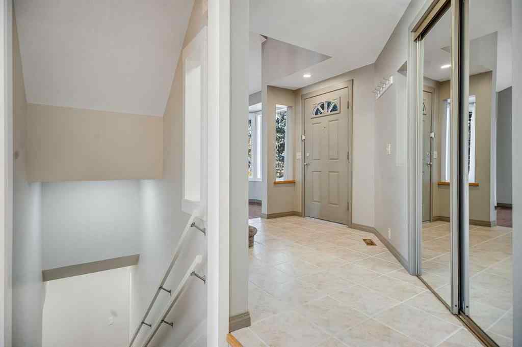 MLS® A2262746 - 107 Wood Valley Drive SW in Woodbine Calgary, Residential