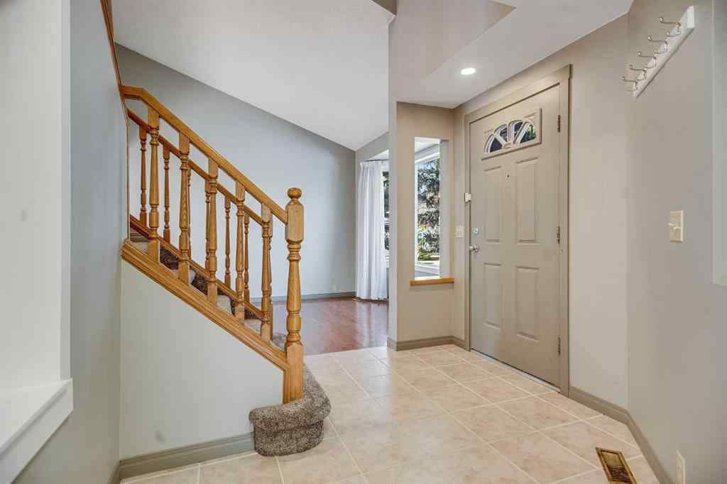 MLS® A2262746 - 107 Wood Valley Drive SW in Woodbine Calgary, Residential