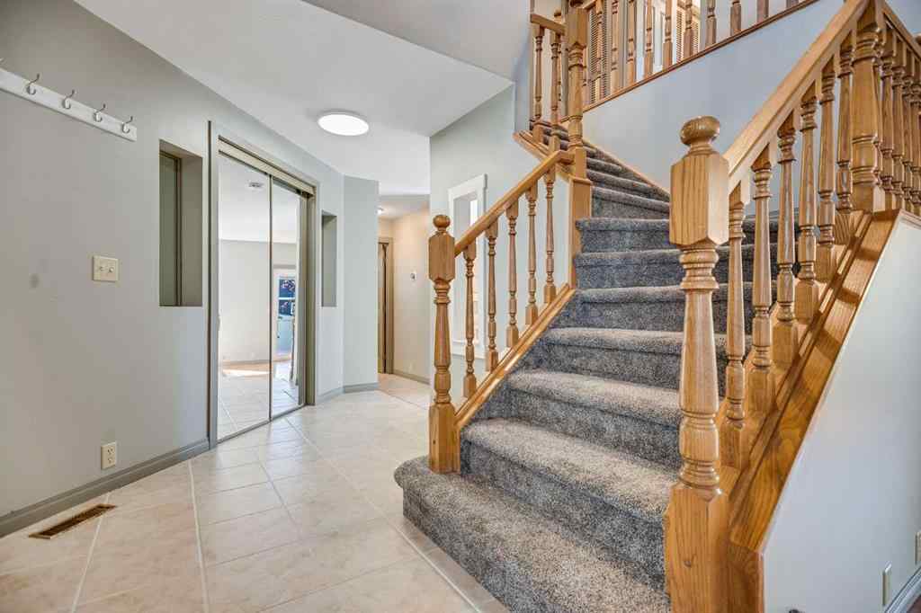 MLS® A2262746 - 107 Wood Valley Drive SW in Woodbine Calgary, Residential