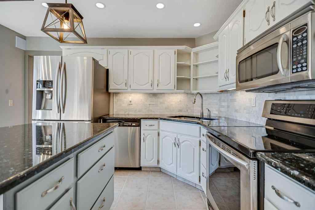 MLS® A2262746 - 107 Wood Valley Drive SW in Woodbine Calgary, Residential