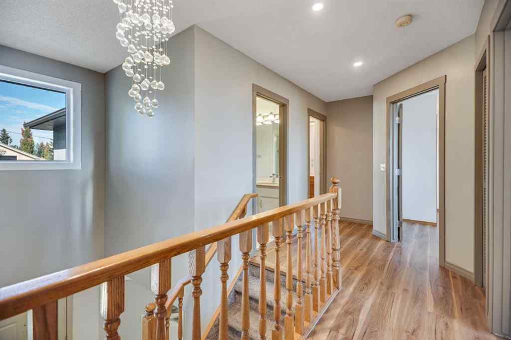 MLS® A2262746 - 107 Wood Valley Drive SW in Woodbine Calgary, Residential