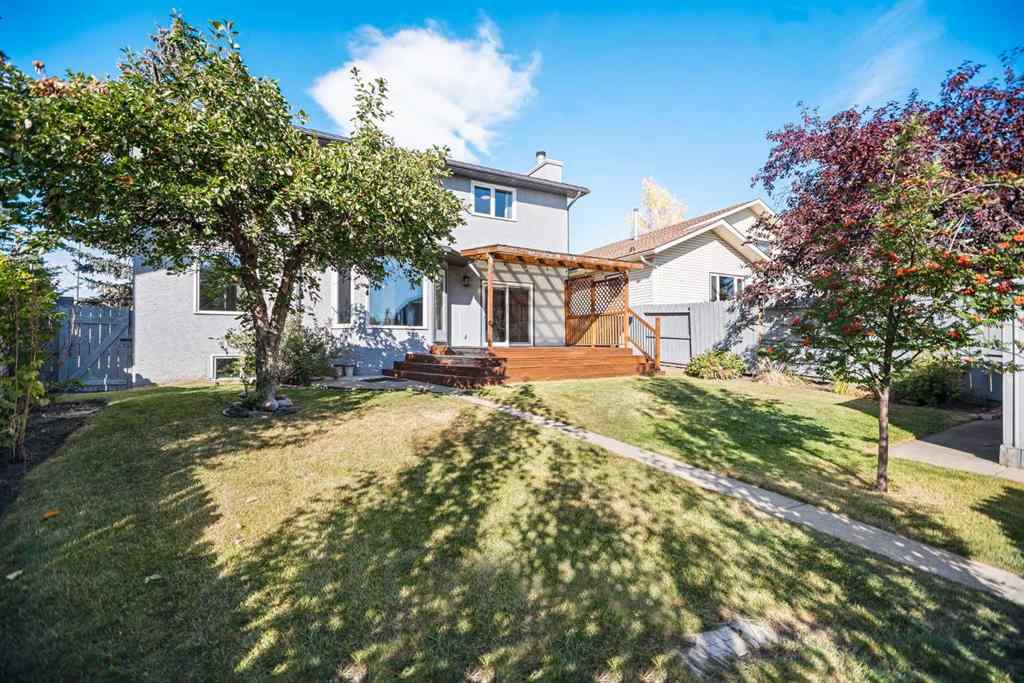 MLS® A2262746 - 107 Wood Valley Drive SW in Woodbine Calgary, Residential