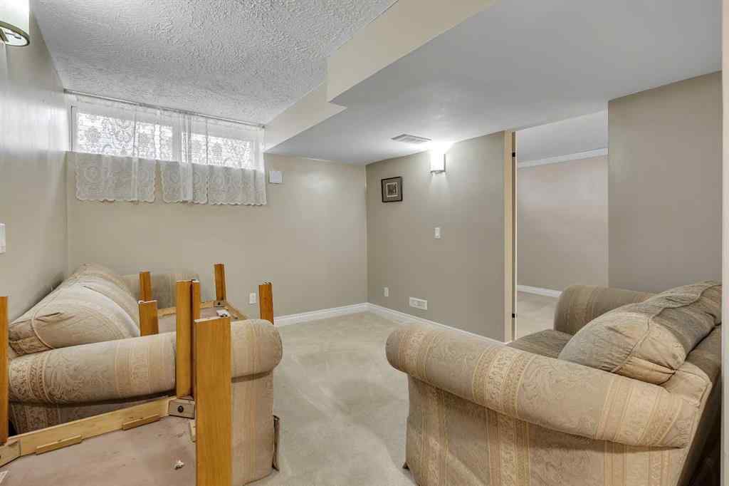 MLS® A2262817 - 8128 Bowglen Crescent NW in Bowness Calgary, Residential