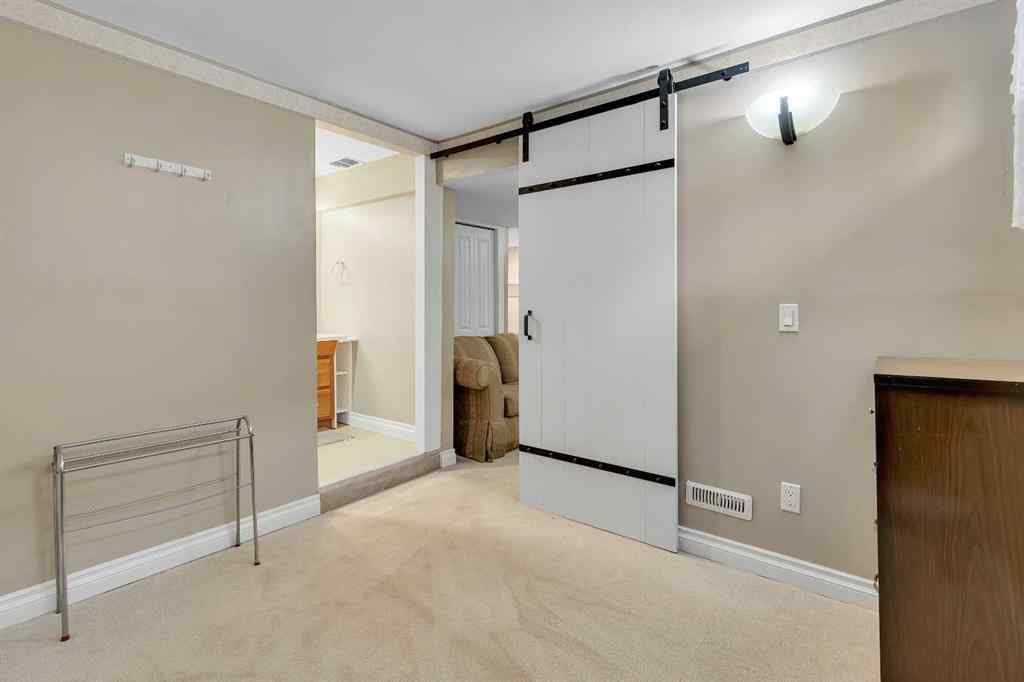 MLS® A2262817 - 8128 Bowglen Crescent NW in Bowness Calgary, Residential