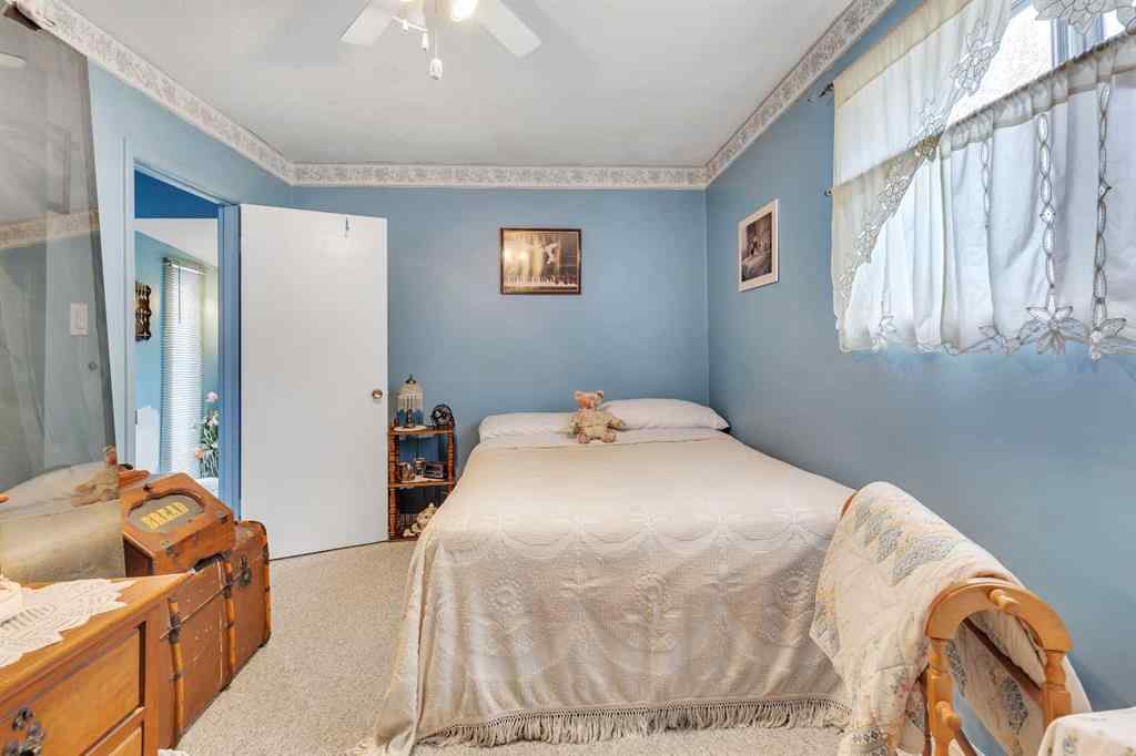 MLS® A2262817 - 8128 Bowglen Crescent NW in Bowness Calgary, Residential