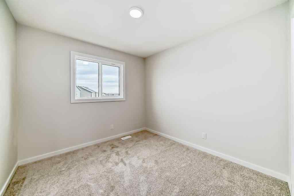 MLS&reg; # A2262818 - 19750 Sheriff King Street SW in Belmont Calgary, Residential Open Houses