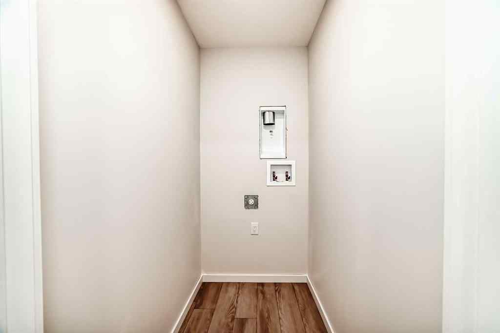 MLS&reg; # A2262818 - 19750 Sheriff King Street SW in Belmont Calgary, Residential Open Houses