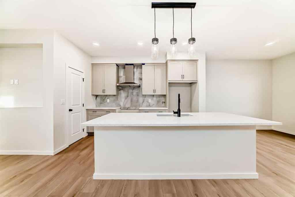 MLS&reg; # A2262818 - 19750 Sheriff King Street SW in Belmont Calgary, Residential Open Houses