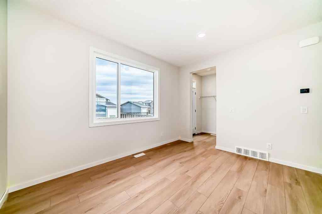 MLS&reg; # A2262818 - 19750 Sheriff King Street SW in Belmont Calgary, Residential Open Houses